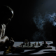 Mujahid (right) and Khaled pass the evening playing chess in a mining camp on the west bank of the Nile River, 40km south of Wawa.